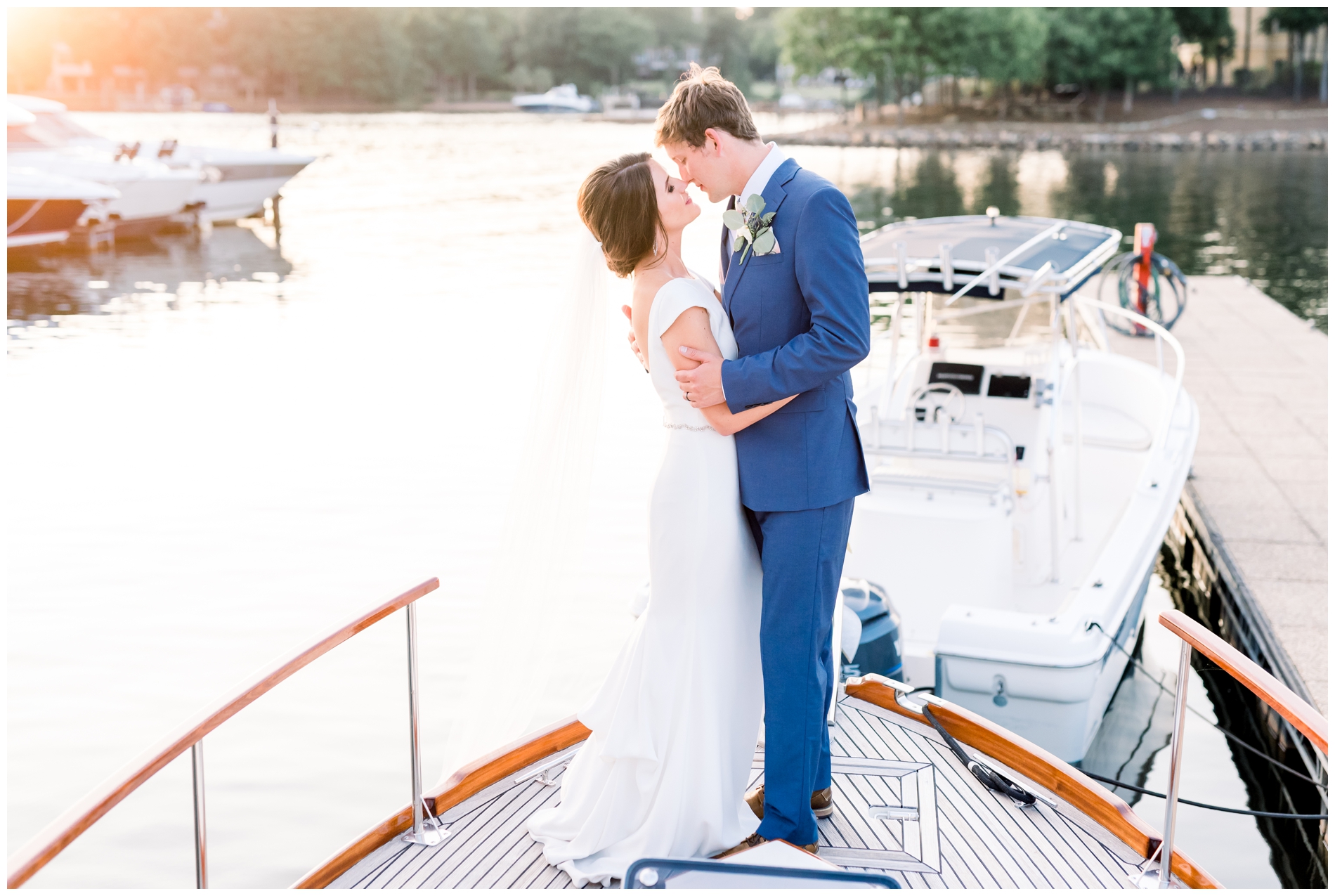 Peninsula Yacht Club Wedding bride and groom on boat at sunset
